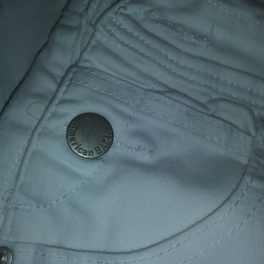 Ripped White overalls